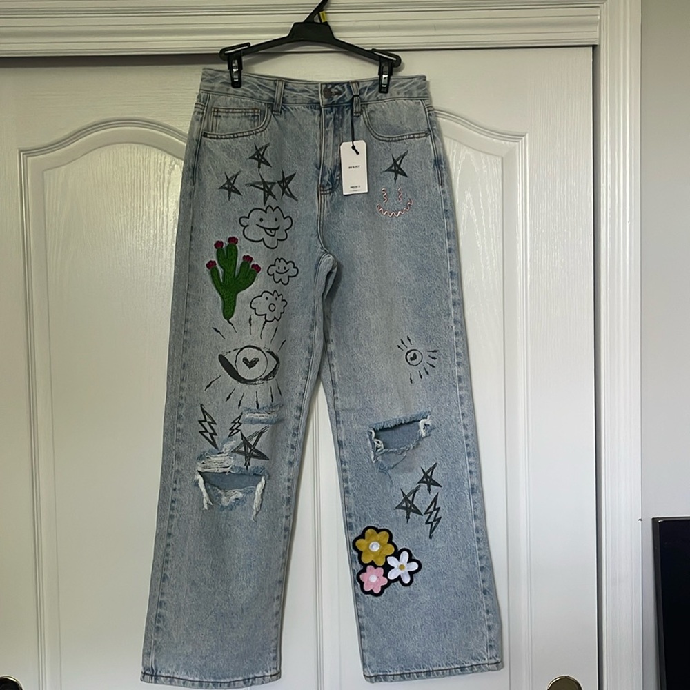 Forever 21 denim with doodle graphics and cactus and floral patches size 28
